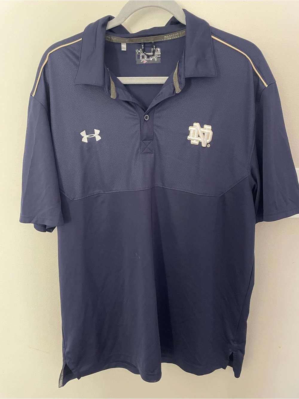 Under Armour Navy Polo with Notre Dame Logo and Gold Accent